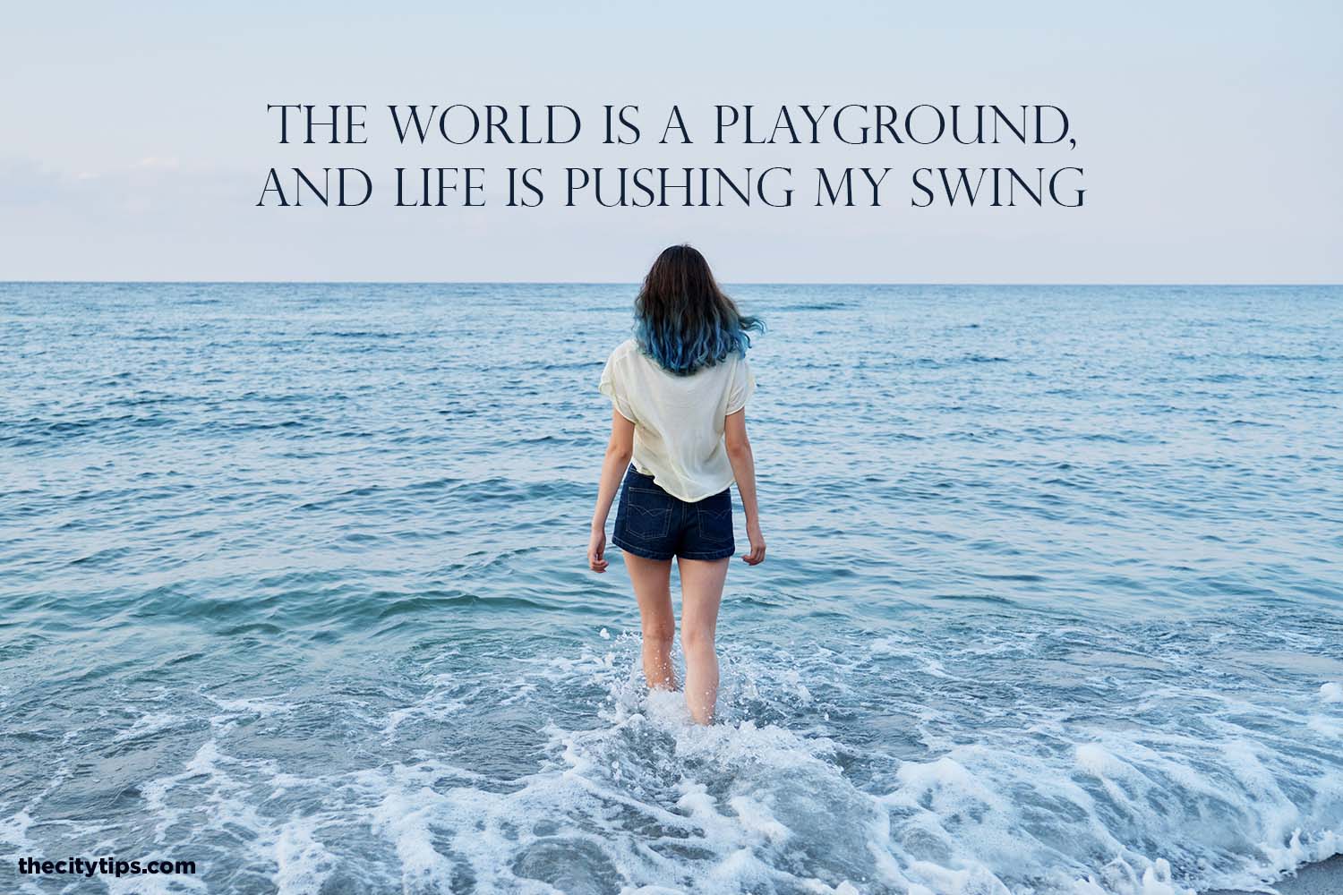 "The world is a playground, and life is pushing my swing." by Natalie Kocsis